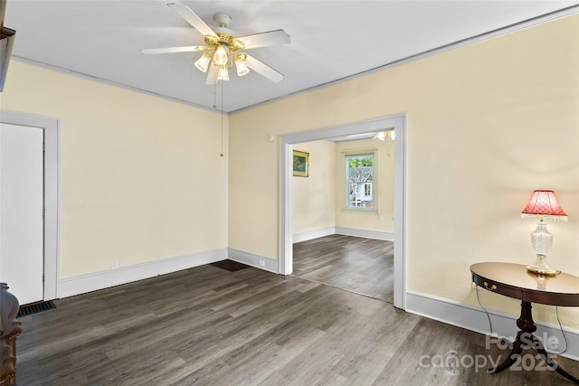 23 Oteen Park Pl, Asheville, NC 28805 - spare room featuring dark wood-type flooring and a ceiling fan