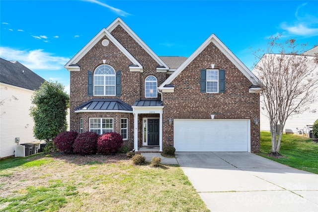 2275 Laurens Dr, Concord, NC 28027 - traditional-style house with brick siding, an attached garage, a standing seam roof, driveway, and a front lawn