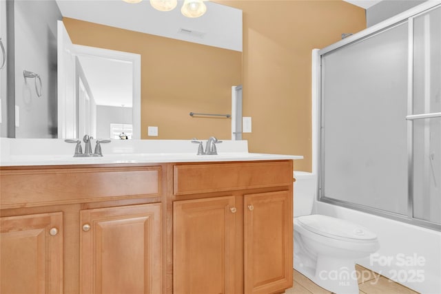 2275 Laurens Dr, Concord, NC 28027 - bathroom with double vanity, bath / shower combo with glass door, and tile patterned flooring