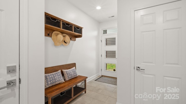 1011 Westbrook Dr Unit A, Charlotte, NC 28202 - mudroom with healthy amount of natural light, light tile patterned floors, and recessed lighting