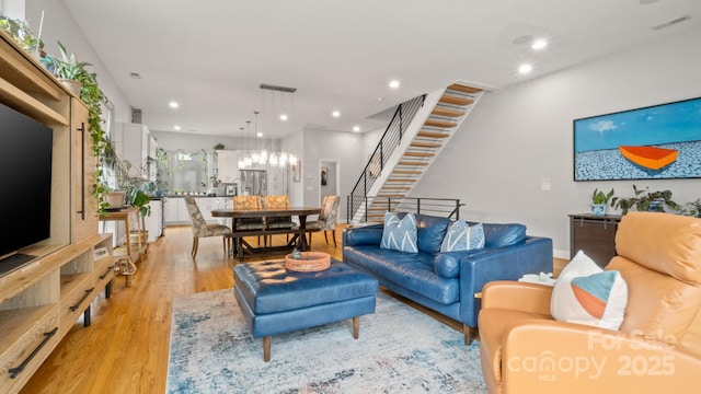 1011 Westbrook Dr Unit A, Charlotte, NC 28202 - living area with stairs, light wood-type flooring, and recessed lighting