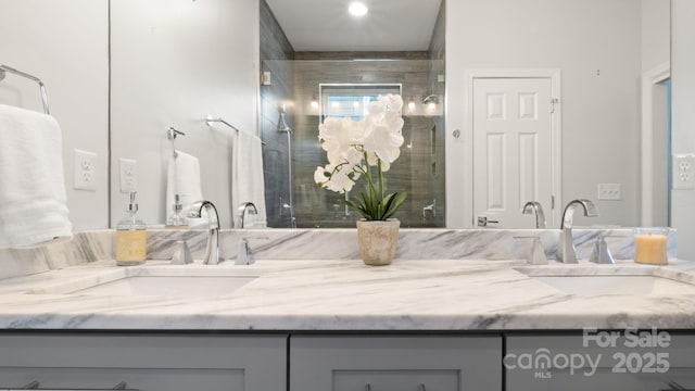 1011 Westbrook Dr Unit A, Charlotte, NC 28202 - bathroom featuring double vanity and a shower stall
