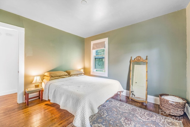 99 Little Oak St, Canton, NC 28716 - bedroom with baseboards and wood finished floors