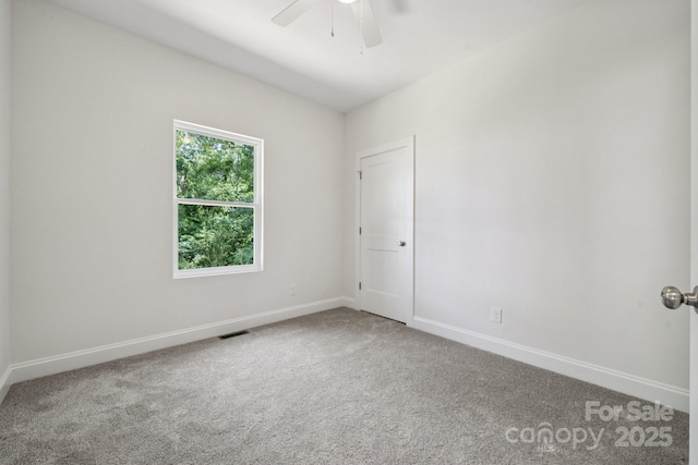 54 Reed St NE, Concord, NC 28025 - unfurnished room featuring carpet flooring and ceiling fan