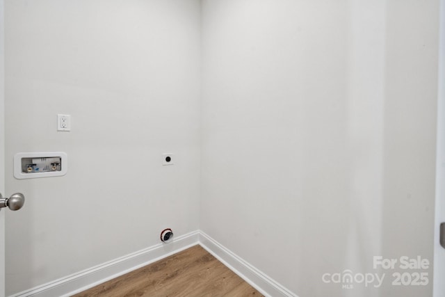 54 Reed St NE, Concord, NC 28025 - laundry room featuring washer hookup, light wood finished floors, and hookup for an electric dryer