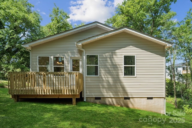 54 Reed St NE, Concord, NC 28025 - back of house with crawl space, a lawn, and a wooden deck
