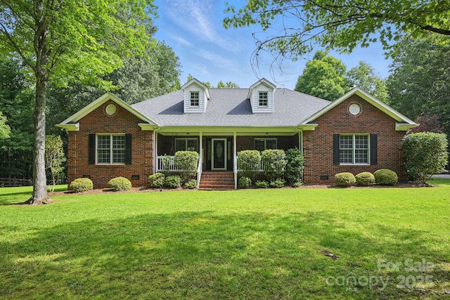 4824 Waxhaw Farms Rd, Waxhaw, NC 28173 - cape cod house featuring brick siding, crawl space, a front lawn, and a porch