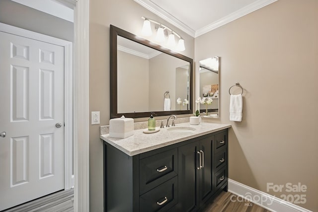 4824 Waxhaw Farms Rd, Waxhaw, NC 28173 - bathroom with vanity, ornamental molding, and wood finished floors