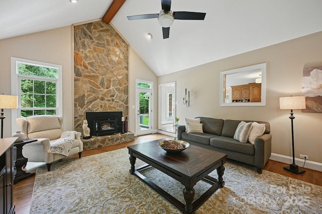 4824 Waxhaw Farms Rd, Waxhaw, NC 28173 - living room with plenty of natural light, wood finished floors, beamed ceiling, ceiling fan, and high vaulted ceiling