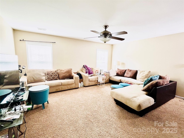 9792 Ravenscroft Ln NW, Concord, NC 28027 - living room featuring carpet floors and a ceiling fan