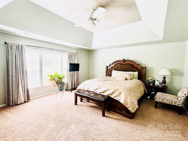 9792 Ravenscroft Ln NW, Concord, NC 28027 - bedroom with carpet flooring, ceiling fan, and a tray ceiling