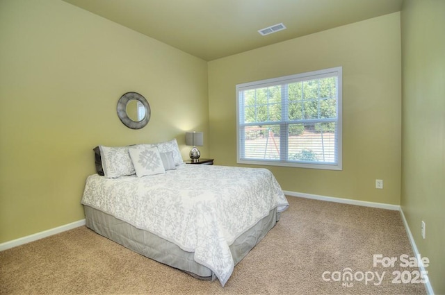9792 Ravenscroft Ln NW, Concord, NC 28027 - bedroom with baseboards and carpet floors