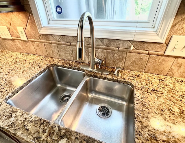 9792 Ravenscroft Ln NW, Concord, NC 28027 - kitchen view of backsplash and stone countertops