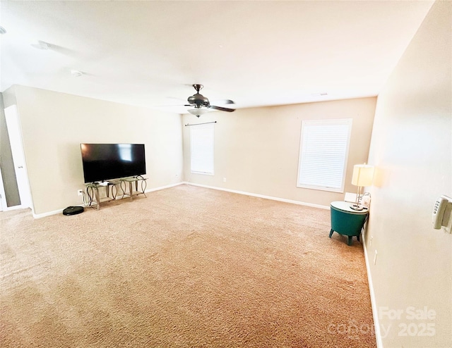 9792 Ravenscroft Ln NW, Concord, NC 28027 - unfurnished living room with carpet flooring and ceiling fan