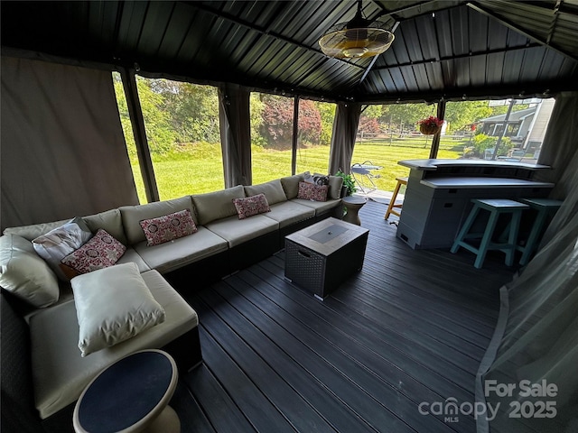 9792 Ravenscroft Ln NW, Concord, NC 28027 - sunroom featuring an outdoor living space, a ceiling fan, plenty of natural light, and vaulted ceiling