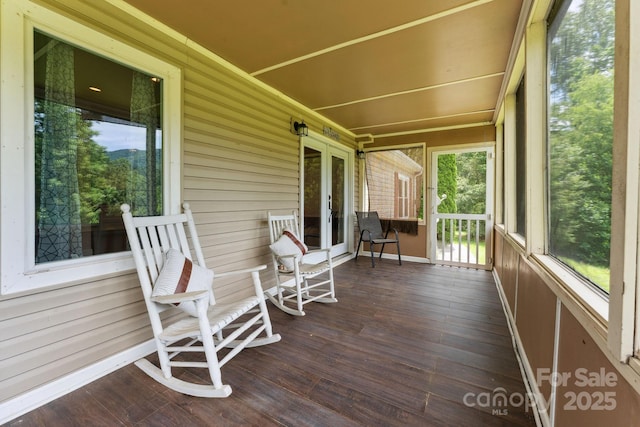 152 Lantana Dr, Sylva, NC 28779 - sunroom / solarium featuring french doors, wood finished floors, and wood walls