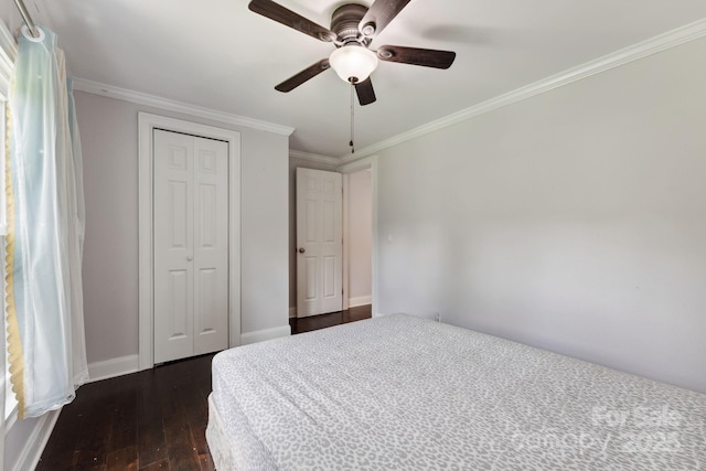 152 Lantana Dr, Sylva, NC 28779 - bedroom with dark wood finished floors, ornamental molding, a closet, and ceiling fan