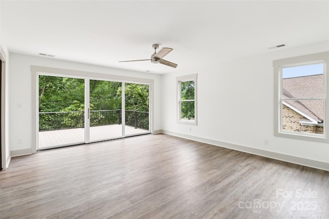 416 Plantation Way Unit 3, Mount Gilead, NC 27306 - spare room featuring wood finished floors and ceiling fan