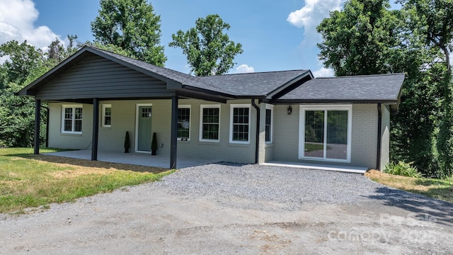 191 Harmony Grove Rd, Nebo, NC 28761 - single story home featuring brick siding, a shingled roof, and driveway