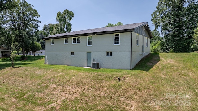 191 Harmony Grove Rd, Nebo, NC 28761 - back of house featuring a yard