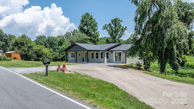 191 Harmony Grove Rd, Nebo, NC 28761 - ranch-style house featuring asphalt driveway and a front lawn