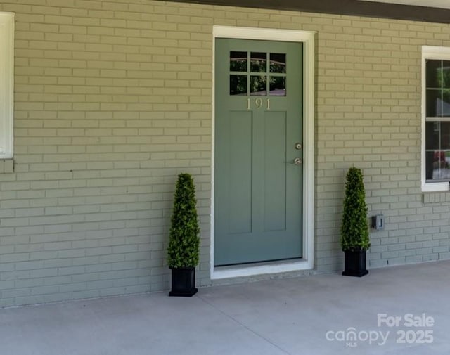 191 Harmony Grove Rd, Nebo, NC 28761 - view of exterior entry with brick siding