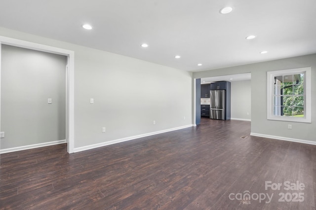191 Harmony Grove Rd, Nebo, NC 28761 - unfurnished living room with dark wood-style floors and recessed lighting