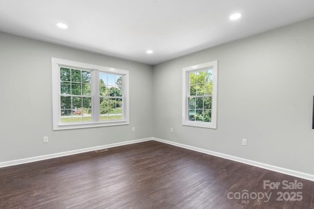 191 Harmony Grove Rd, Nebo, NC 28761 - empty room featuring dark wood-style flooring and recessed lighting