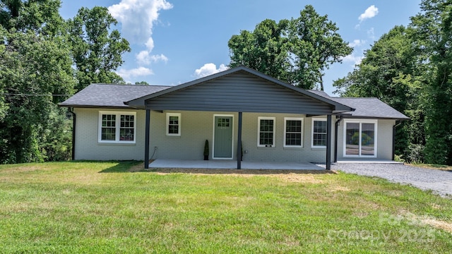 191 Harmony Grove Rd, Nebo, NC 28761 - view of front of house with a patio area, brick siding, and a front yard