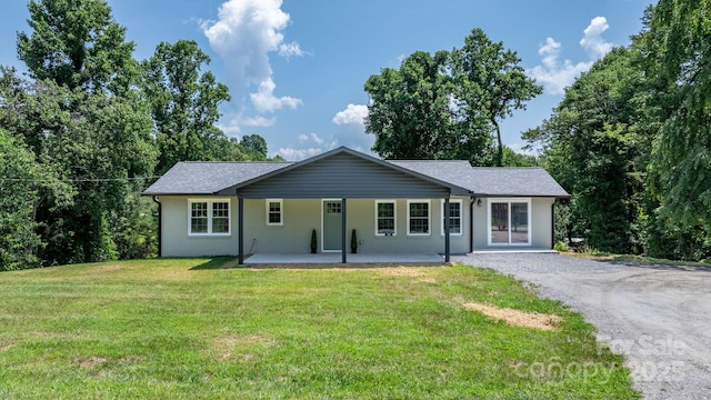 191 Harmony Grove Rd, Nebo, NC 28761 - single story home featuring a front yard, gravel driveway, and covered porch