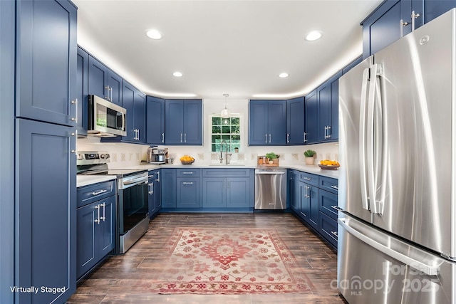 191 Harmony Grove Rd, Nebo, NC 28761 - kitchen with appliances with stainless steel finishes, blue cabinets, dark wood-style floors, and recessed lighting