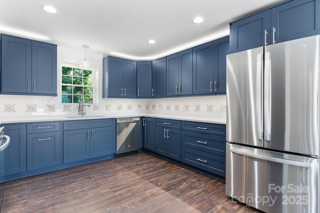 191 Harmony Grove Rd, Nebo, NC 28761 - kitchen featuring stainless steel appliances, blue cabinetry, dark wood-type flooring, and recessed lighting
