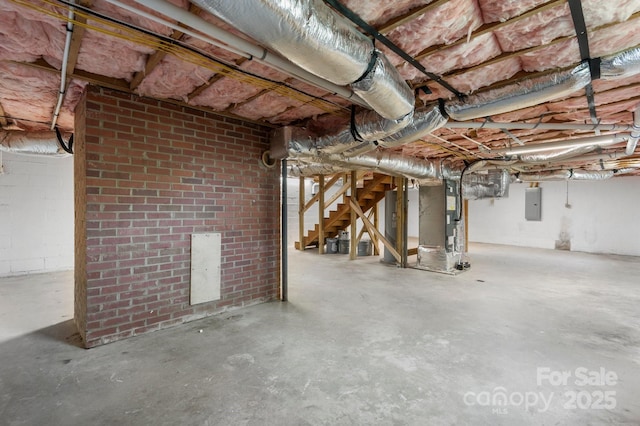 191 Harmony Grove Rd, Nebo, NC 28761 - unfinished basement with electric panel and stairway
