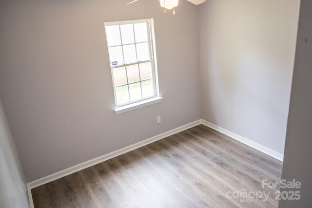 830 Mcarthur Ave, Charlotte, NC 28206 - spare room with ceiling fan and wood finished floors