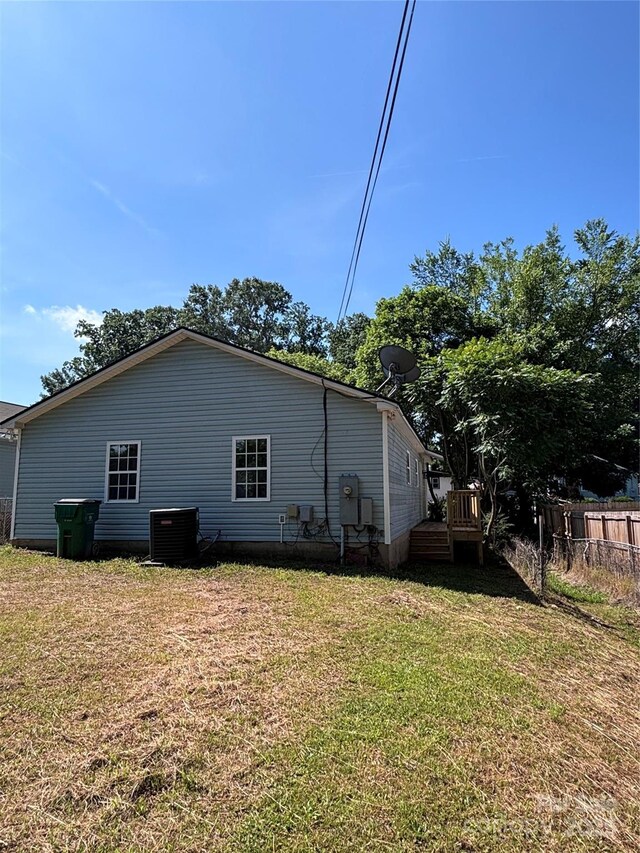 830 Mcarthur Ave, Charlotte, NC 28206 - view of side of home featuring a central AC unit and a wooden deck