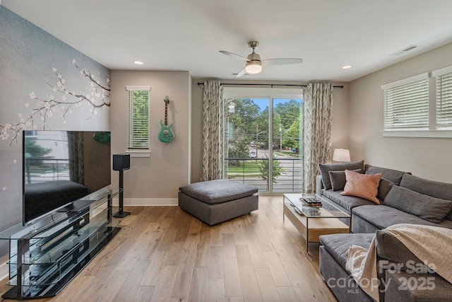 2969 Simpson Dr, Charlotte, NC 28205 - living room featuring healthy amount of natural light, wood finished floors, a ceiling fan, and recessed lighting