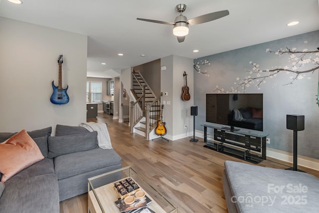 2969 Simpson Dr, Charlotte, NC 28205 - living area featuring stairway, ceiling fan, light wood-style flooring, and recessed lighting