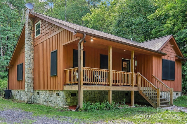2171 Black Rock Rd, Cherokee, NC 28719 - view of front of house featuring a shingled roof and a porch
