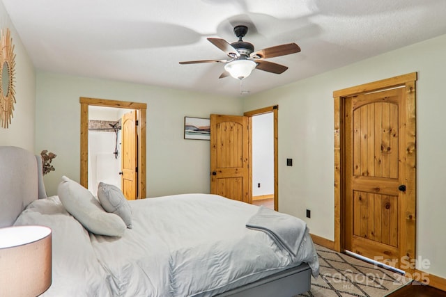 2171 Black Rock Rd, Cherokee, NC 28719 - bedroom featuring a ceiling fan and baseboards