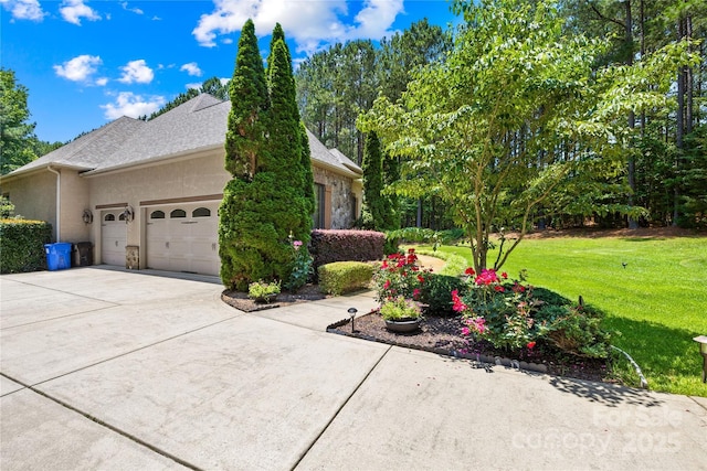 168 Blue Ridge Trl, Mooresville, NC 28117 - view of property exterior featuring an attached garage, a lawn, driveway, and stucco siding