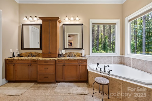 168 Blue Ridge Trl, Mooresville, NC 28117 - bathroom featuring plenty of natural light, double vanity, a garden tub, crown molding, and tile patterned floors