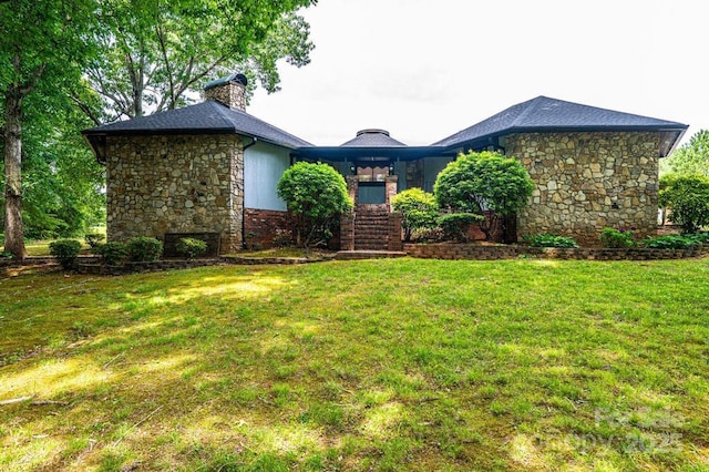 4275 Herman Sipe Rd, Conover, NC 28613 - view of front facade with stone siding, a front yard, and a chimney