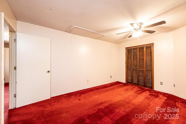 4275 Herman Sipe Rd, Conover, NC 28613 - unfurnished bedroom with attic access, carpet, a textured ceiling, and ceiling fan