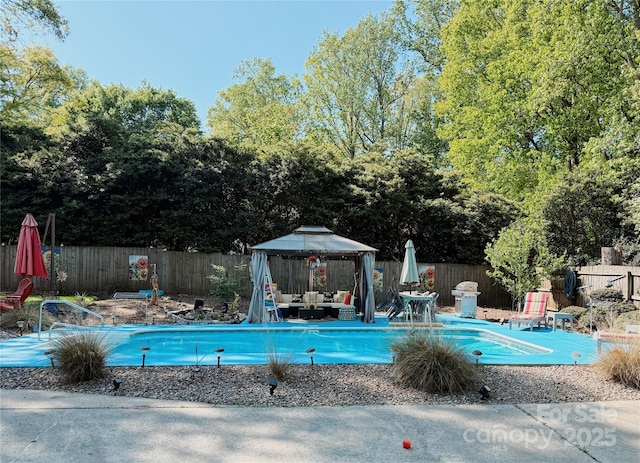 5017 Celeste Ct, Charlotte, NC 27609 - view of pool with a gazebo, an outdoor hangout area, a patio area, and a fenced backyard