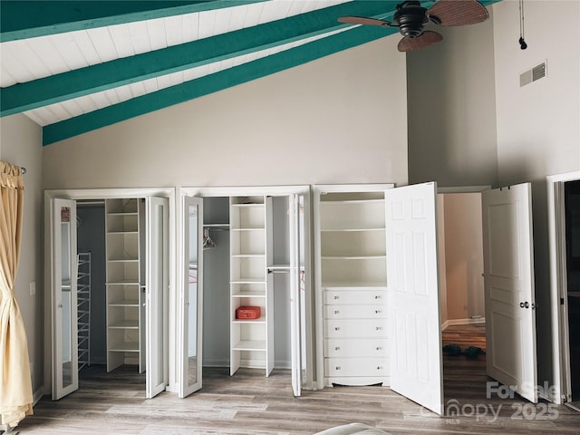 5017 Celeste Ct, Charlotte, NC 27609 - unfurnished bedroom featuring multiple closets, wood finished floors, and wooden ceiling