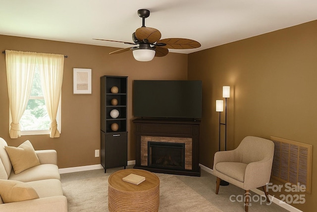 5017 Celeste Ct, Charlotte, NC 27609 - living area with light colored carpet, ceiling fan, and a fireplace