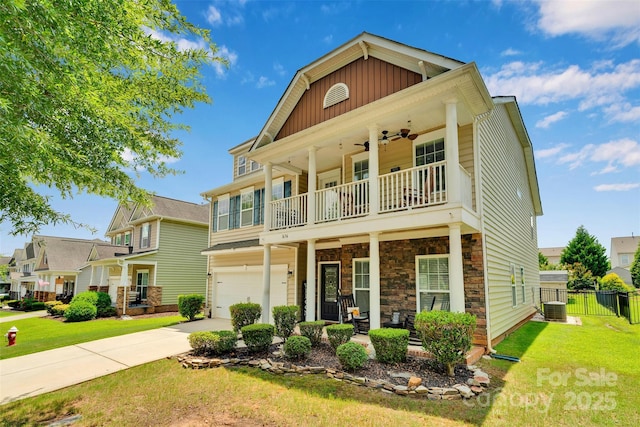 1636 Ridge Haven Rd, Waxhaw, NC 28173 - craftsman-style house with a balcony, board and batten siding, a garage, driveway, and a porch