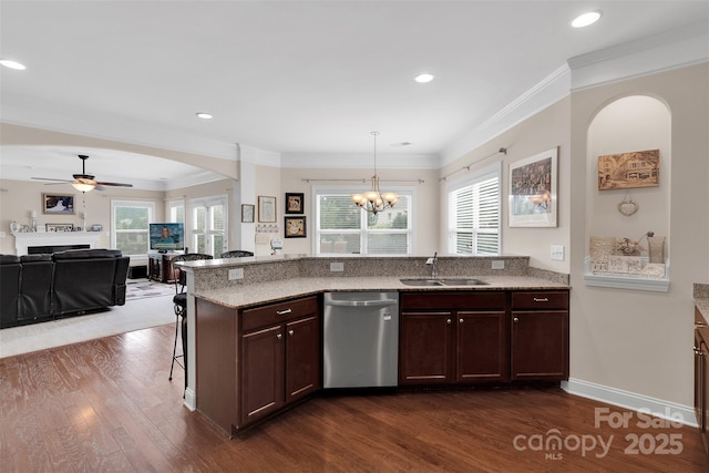 1636 Ridge Haven Rd, Waxhaw, NC 28173 - kitchen featuring dishwasher, dark wood-style floors, arched walkways, a ceiling fan, and crown molding