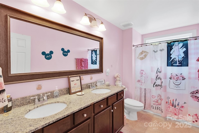 1636 Ridge Haven Rd, Waxhaw, NC 28173 - bathroom with double vanity and tile patterned floors