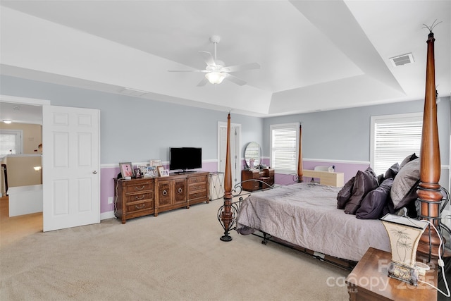 1636 Ridge Haven Rd, Waxhaw, NC 28173 - carpeted bedroom featuring a raised ceiling and a ceiling fan